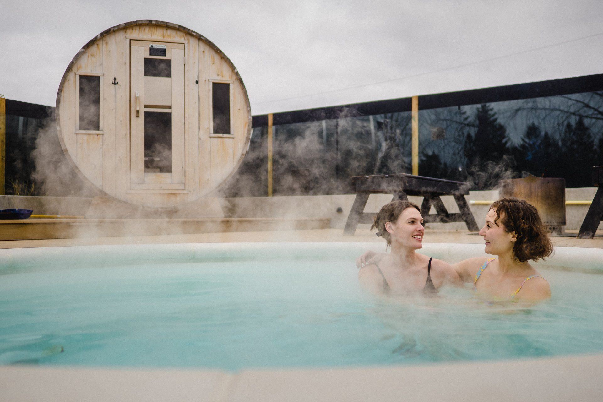 Couple relaxing in hot tub 